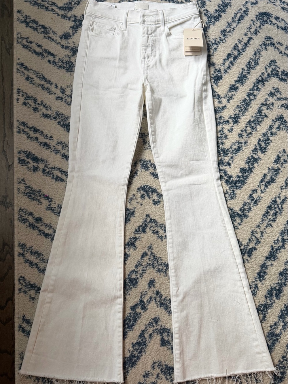 MOTHER White Flared Jeans with Raw Hem